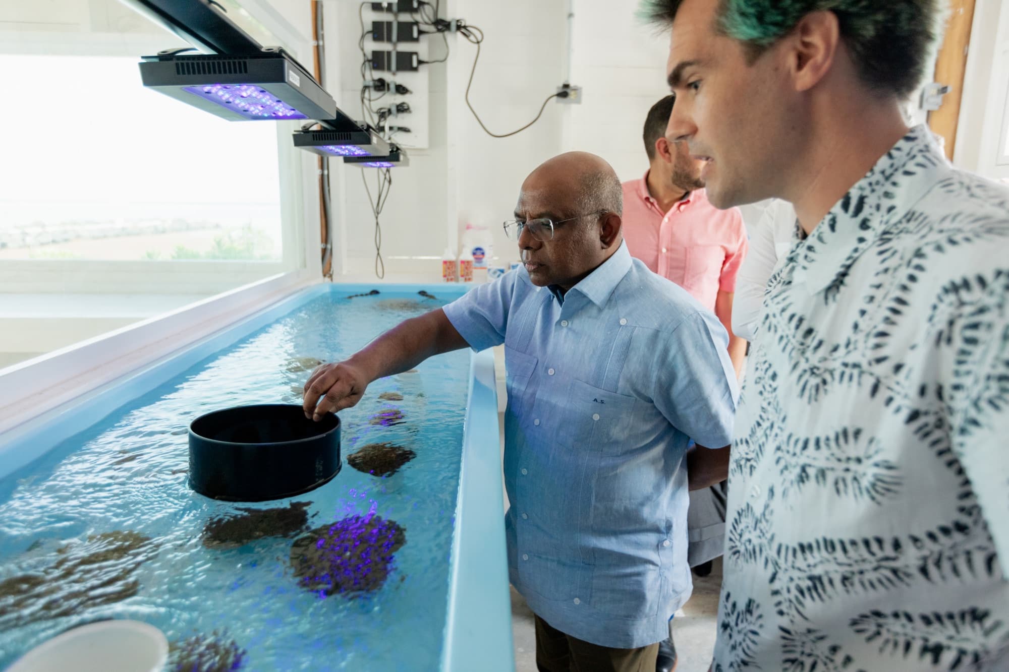 Abdulla Shahid, former President of the UN General Assembly, viewing corals grown by Coral Growth Solutions